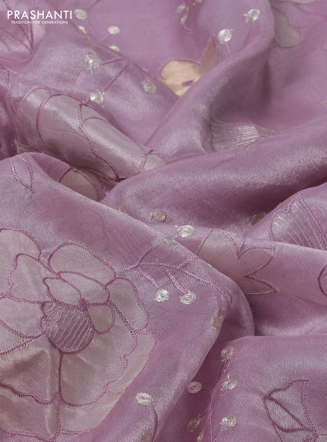 Pure tissue silk saree lavender with allover floral embroidery work and simple embroidery border