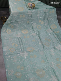 Pure tissue silk saree pastel blue with allover floral embroidery work and simple embroidery border
