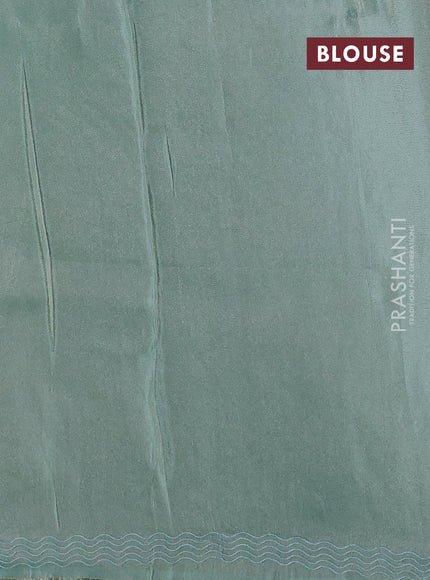 Pure tissue silk saree pastel blue with allover floral embroidery work and simple embroidery border