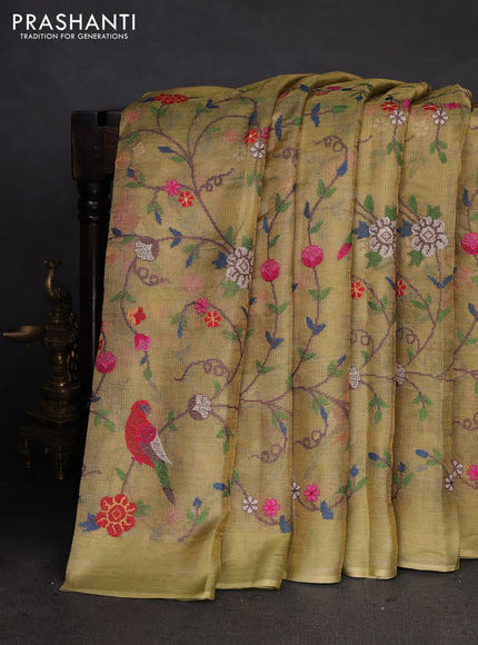 Pure tissue silk saree pista green with allover convent embroidery work and simple border