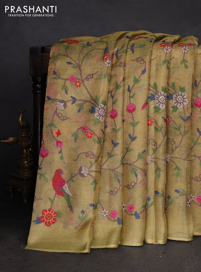 Pure tissue silk saree pista green with allover convent embroidery work and simple border