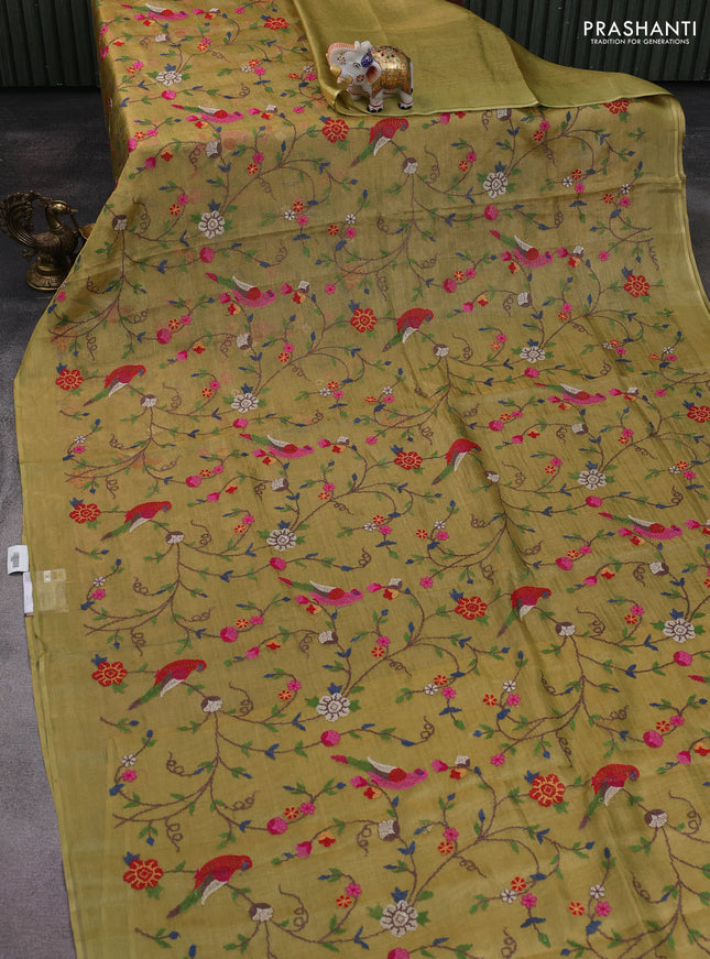 Pure tissue silk saree pista green with allover convent embroidery work and simple border