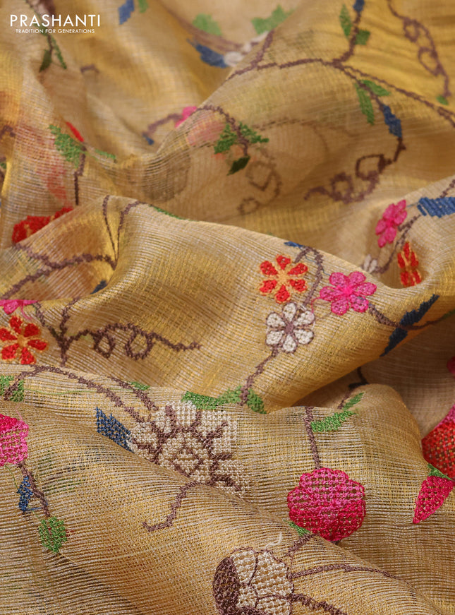 Pure tissue silk saree gold with allover convent embroidery work and simple border