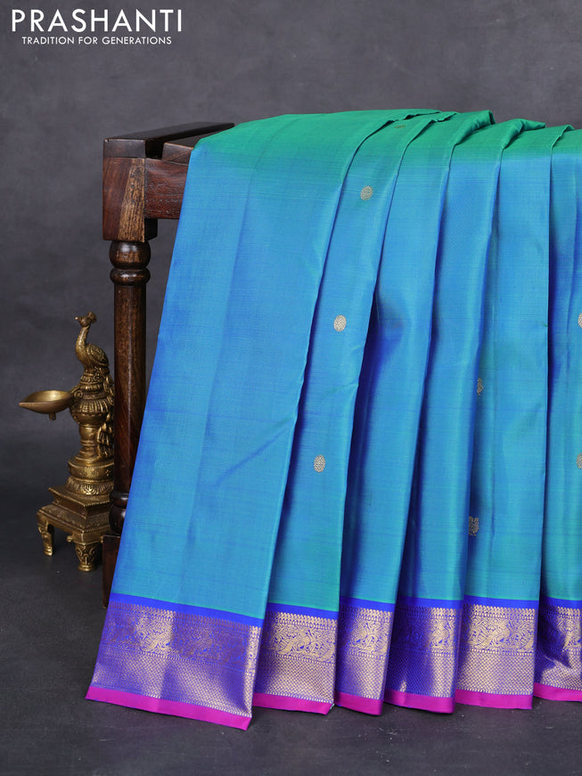 Pure kanchipuram silk saree dual shade of bluish green and blue with zari woven buttas and zari woven border