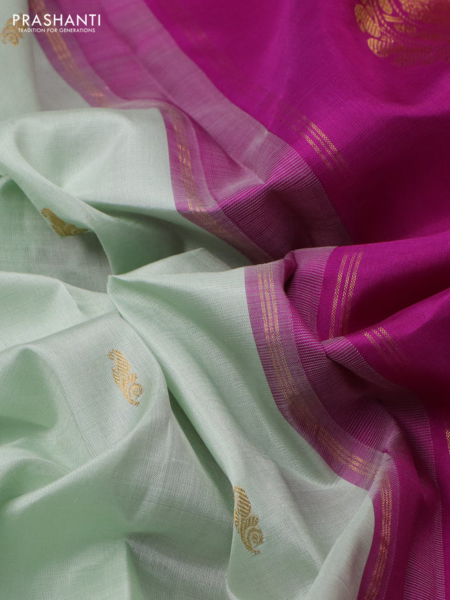Pure kanchipuram silk saree teal shade and purple with zari woven buttas and zari woven korvai border