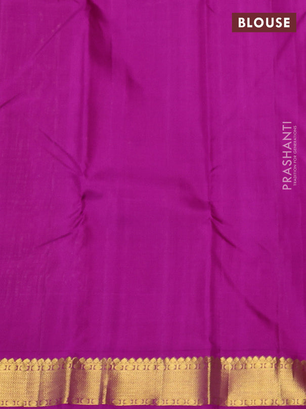 Pure kanchipuram silk saree teal shade and purple with zari woven buttas and zari woven korvai border