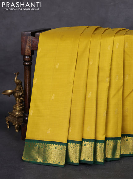 Pure kanchipuram silk saree mustard yellow and green with zari woven buttas and rich zari woven border