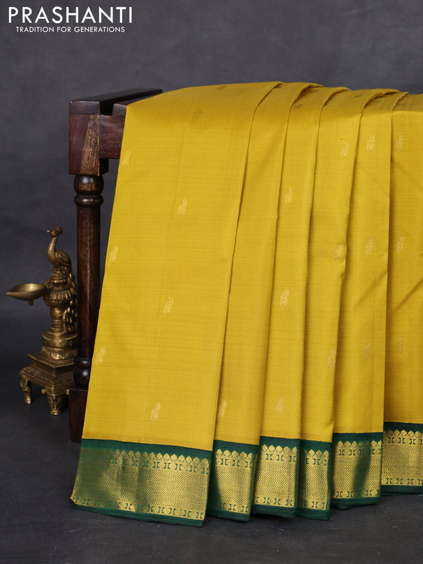 Pure kanchipuram silk saree mustard yellow and green with zari woven buttas and rich zari woven border