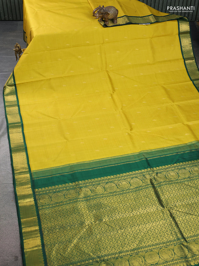 Pure kanchipuram silk saree mustard yellow and green with zari woven buttas and rich zari woven border