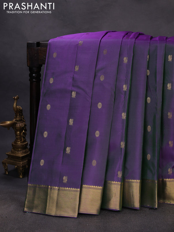 Pure kanchipuram silk saree dual shade of greenish violet with allover zari woven buttas and zari woven border
