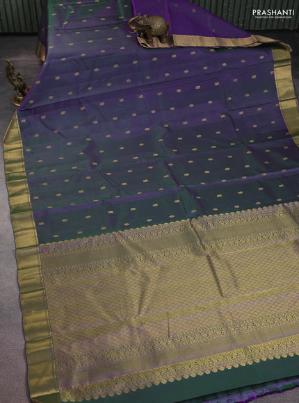Pure kanchipuram silk saree dual shade of greenish violet with allover zari woven buttas and zari woven border
