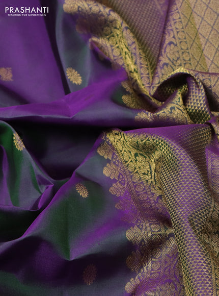 Pure kanchipuram silk saree dual shade of greenish violet with allover zari woven buttas and zari woven border