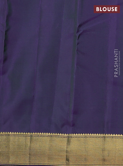Pure kanchipuram silk saree dual shade of greenish violet with allover zari woven buttas and zari woven border