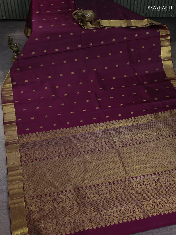 Pure kanchipuram silk saree wine shade with zari woven buttas and zari woven border