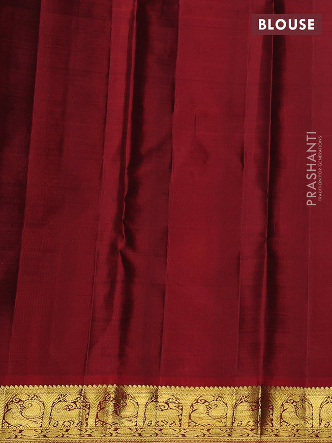 Pure kanchipuram silk saree greem and maroon with zari woven annam buttas and rich zari woven border