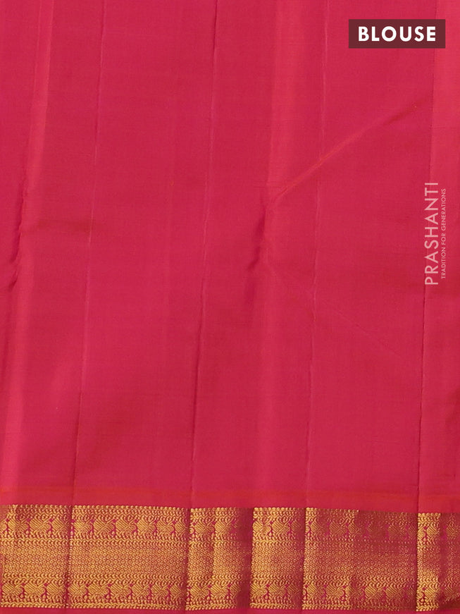 Pure kanchipuram silk saree green and dual shade of pinkish orange with plain body and zari woven korvai border
