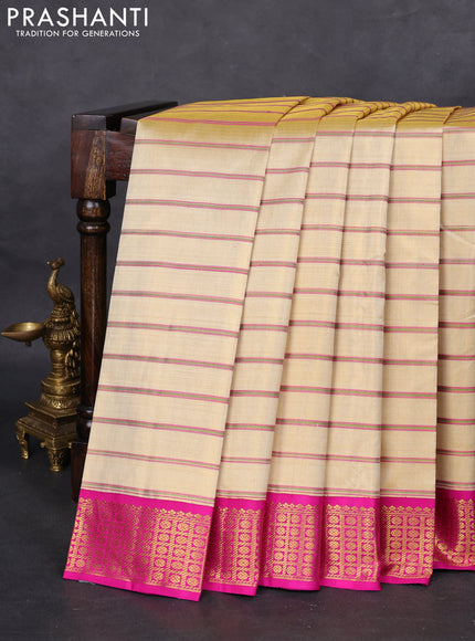Pure kanchipuram tissue silk saree gold with allover stripe pattern and ganga jamuna border