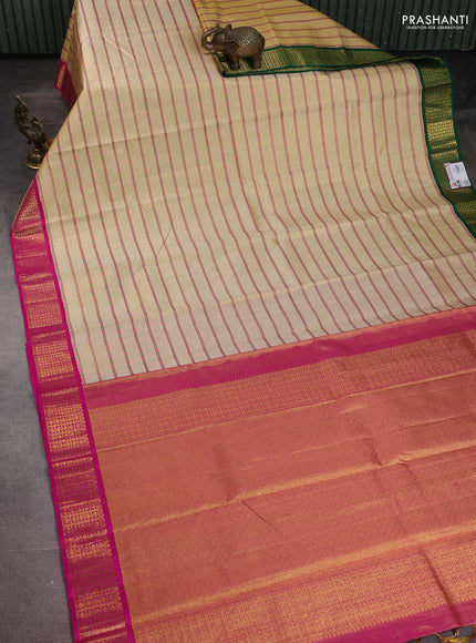 Pure kanchipuram tissue silk saree gold with allover stripe pattern and ganga jamuna border