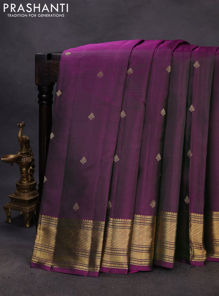 Pure kanchipuram silk saree dual shade of greenish purple with zari woven buttas and rich zari woven border