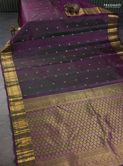 Pure kanchipuram silk saree dual shade of greenish purple with zari woven buttas and rich zari woven border