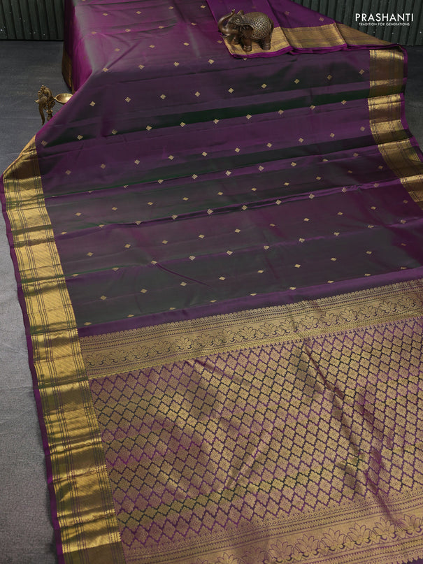Pure kanchipuram silk saree dual shade of greenish purple with zari woven buttas and rich zari woven border