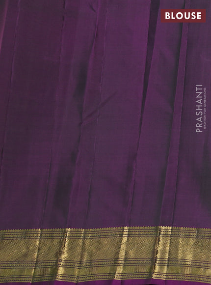 Pure kanchipuram silk saree dual shade of greenish purple with zari woven buttas and rich zari woven border