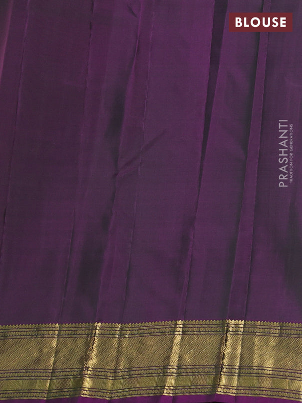 Pure kanchipuram silk saree dual shade of greenish purple with zari woven buttas and rich zari woven border