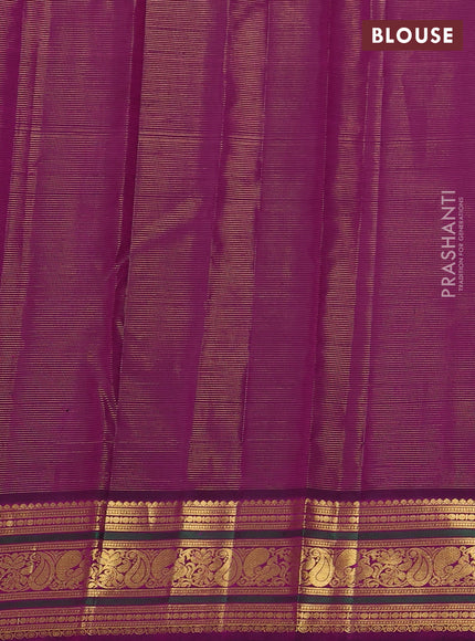 Pure kanchipuram silk saree mild pista green and purple with allover zari woven stripe pattern and zari woven korvai border