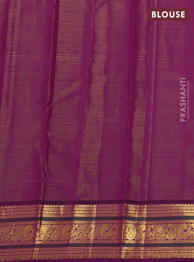 Pure kanchipuram silk saree mild pista green and purple with allover zari woven stripe pattern and zari woven korvai border