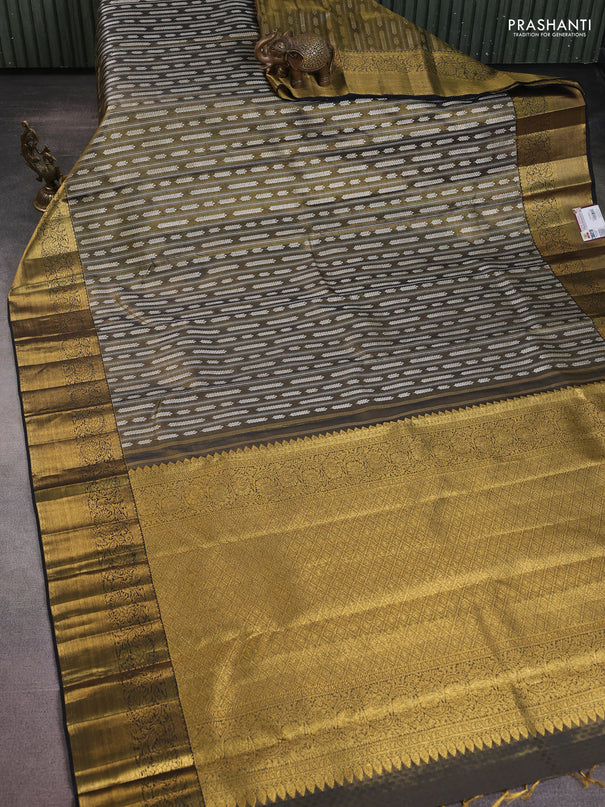 Pure kanchipuram silk saree dual shade of gold and black with allover silver zari brocade weaves and rich zari woven border