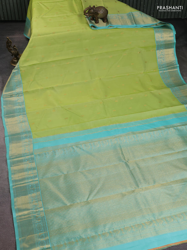 Pure kanchipuram silk saree pista green and teal blue with zari woven buttas and rich zari woven korvai border
