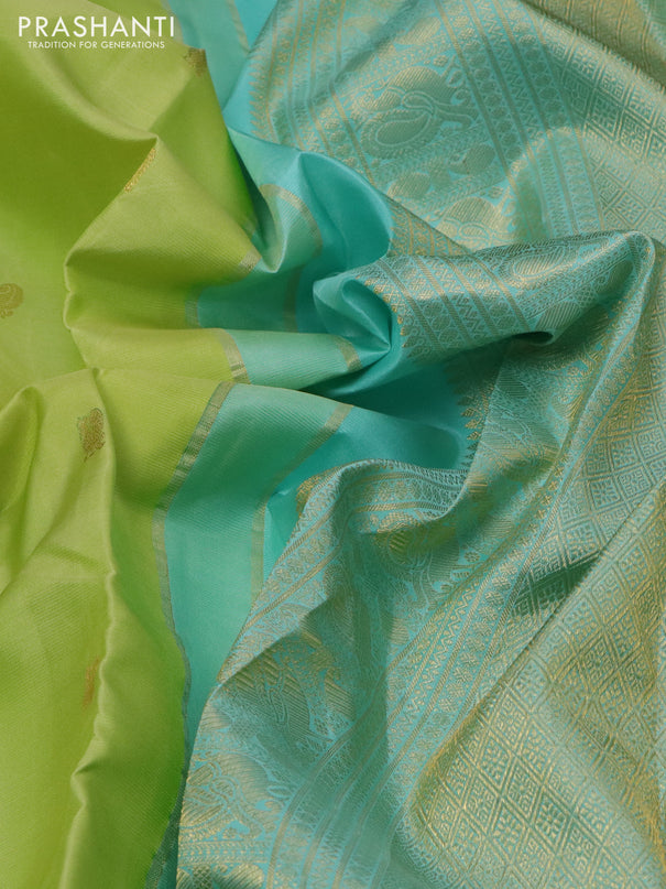 Pure kanchipuram silk saree pista green and teal blue with zari woven buttas and rich zari woven korvai border