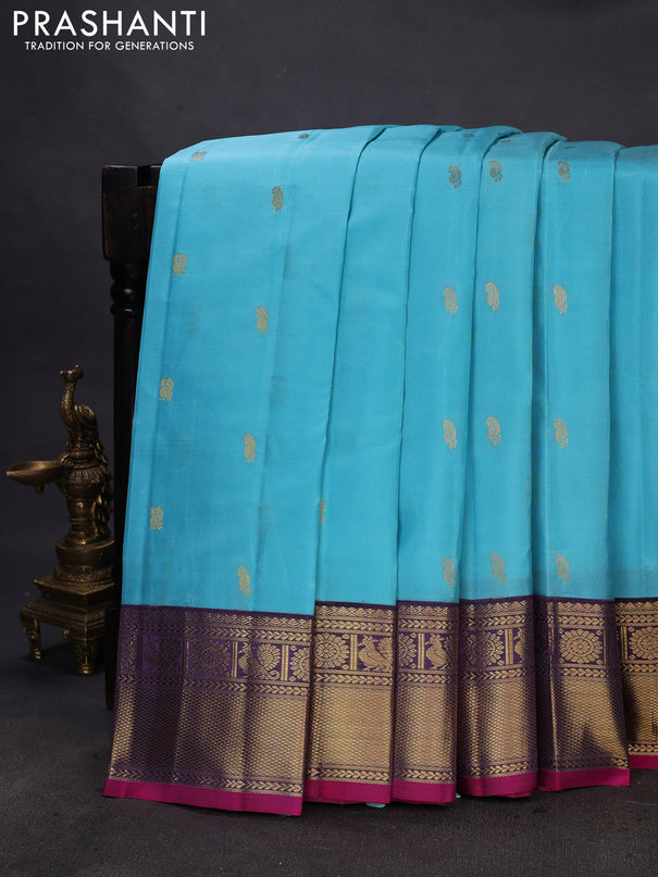 Pure kanchipuram silk saree light blue and jamun shade with zari woven buttas and rich zari woven border