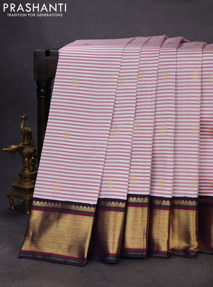 Pure kanchipuram silk saree off white maroon and jamun shade with allover stripe pattern & zari buttas and rich zari woven border