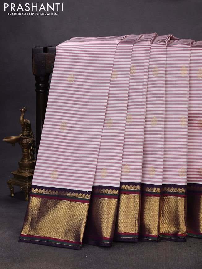 Pure kanchipuram silk saree off white maroon and jamun shade with allover stripe pattern & zari buttas and rich zari woven border