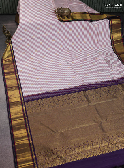 Pure kanchipuram silk saree off white maroon and jamun shade with allover stripe pattern & zari buttas and rich zari woven border