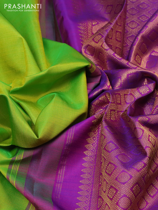 Pure kanchipuram silk saree light green and purple with plain body and rich zari woven border