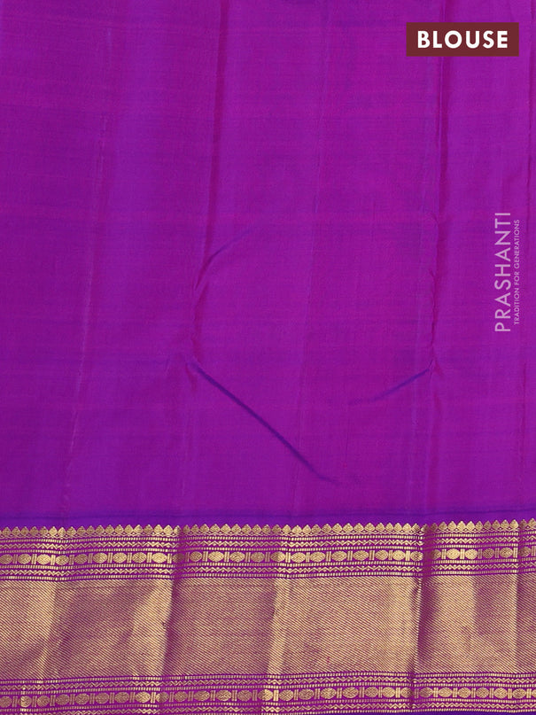 Pure kanchipuram silk saree light green and purple with plain body and rich zari woven border