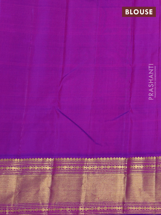 Pure kanchipuram silk saree light green and purple with plain body and rich zari woven border