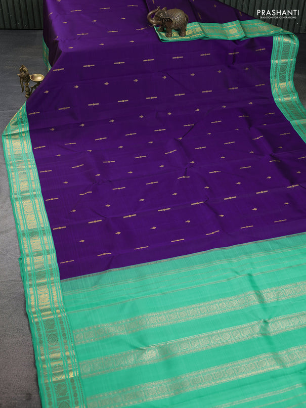 Pure kanchipuram silk saree violet and teal green shade with zari woven buttas and rich zari woven korvai border