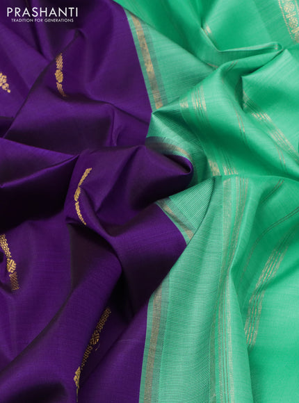 Pure kanchipuram silk saree violet and teal green shade with zari woven buttas and rich zari woven korvai border