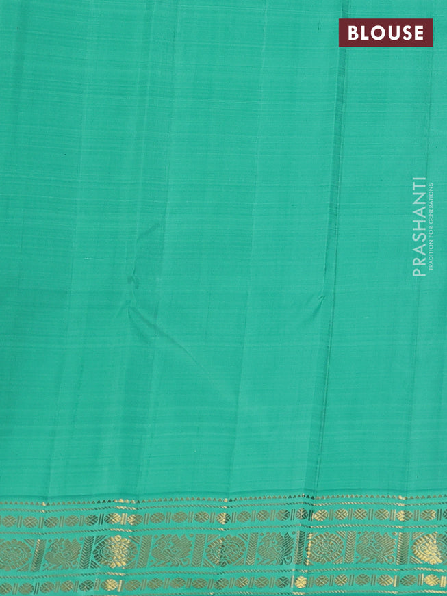 Pure kanchipuram silk saree violet and teal green shade with zari woven buttas and rich zari woven korvai border