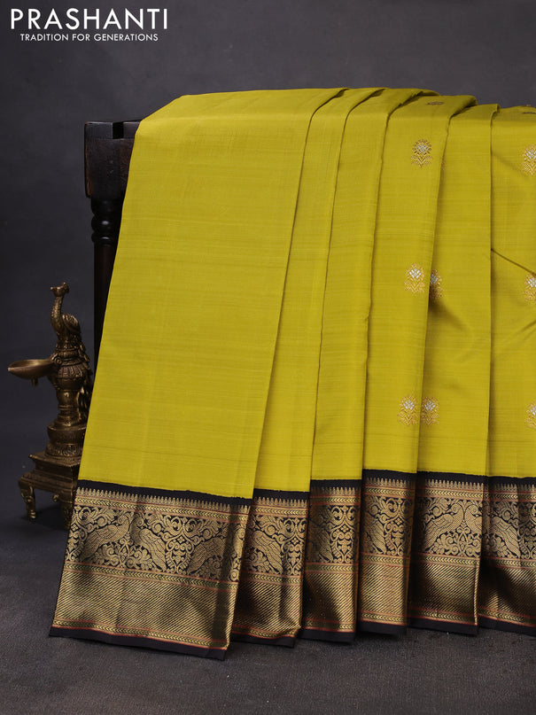 Pure kanchipuram silk saree lime green and black with zari woven buttas and rich zari woven korvai border
