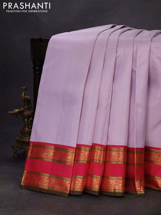 Pure kanchipuram silk saree mild lavender and pink with allover zari stripe pattern and rettapet zari woven korvai border