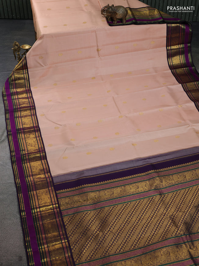 Pure kanchipuram silk saree sandal and jamun shade with zari woven buttas and rich zari woven border