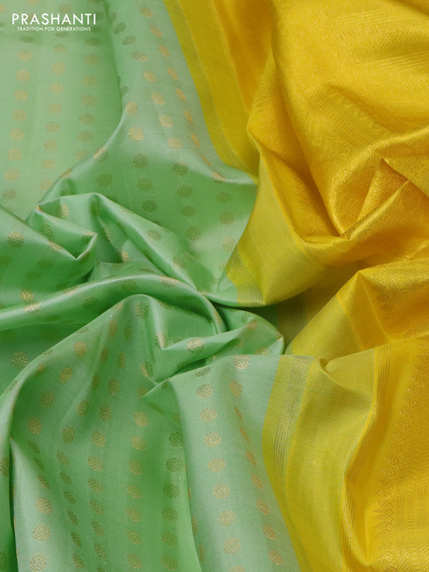 Pure kanchipuram silk saree pastel green and yellow with allover zari woven 1000 buttas and long zari woven border