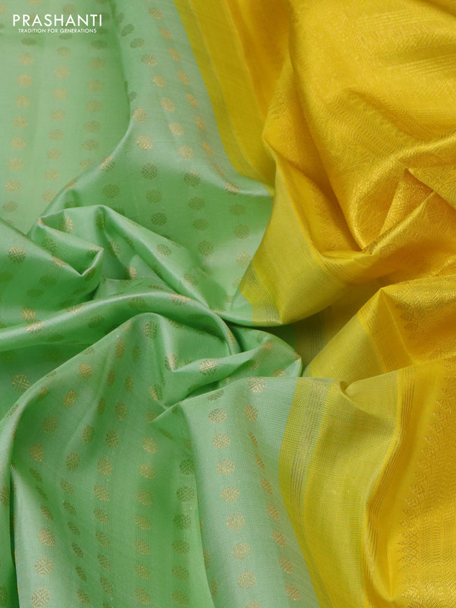 Pure kanchipuram silk saree pastel green and yellow with allover zari woven 1000 buttas and long zari woven border