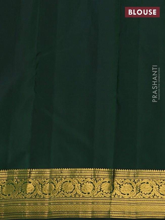 Pure kanchipuram silk saree bottle green with zari woven buttas and zari woven border