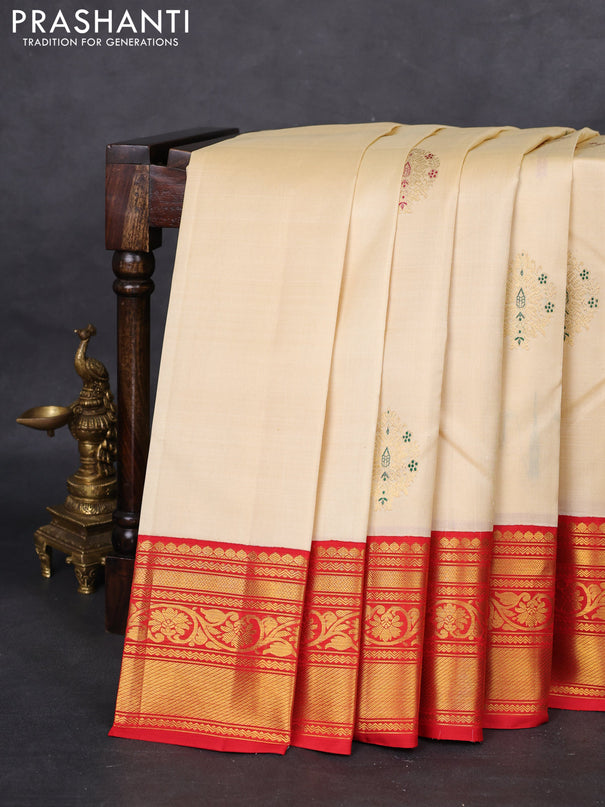 Pure kanchipuram silk saree cream with zari woven buttas and ganga jamuna border