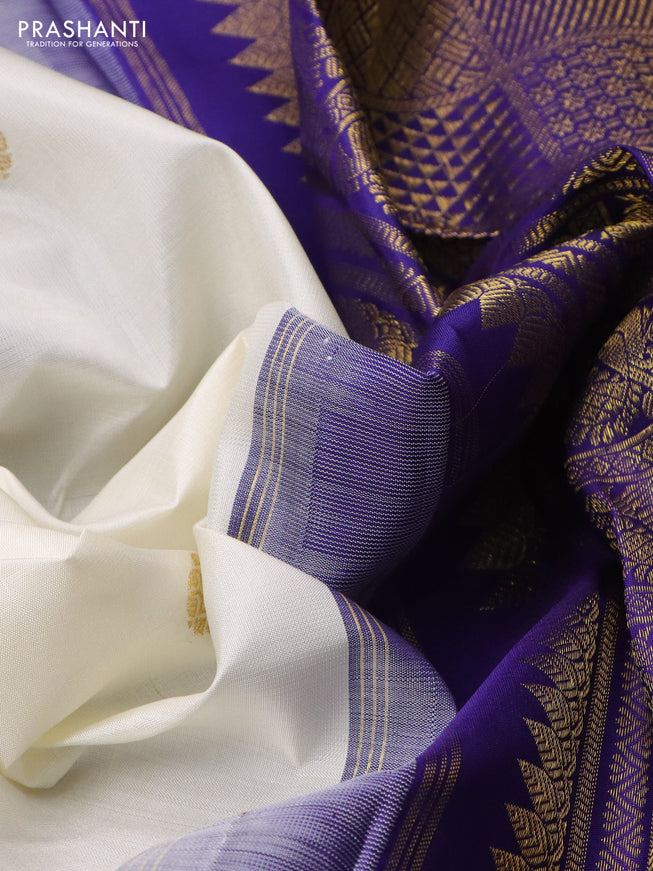 Pure kanchipuram silk saree off white and blue with zari woven buttas and zari woven korvai border
